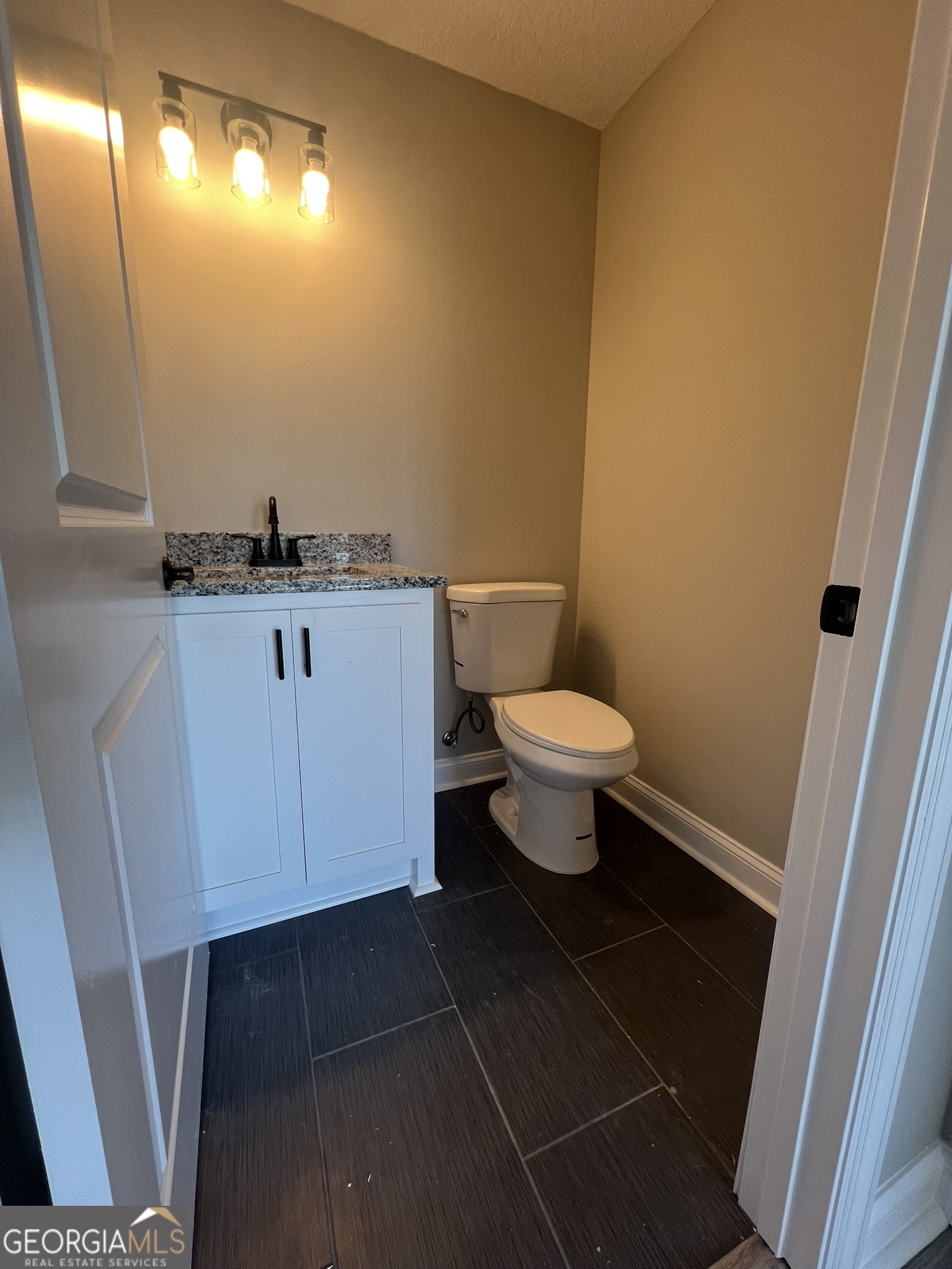 120 Caleb Circle Jesup, GA 31545 - Photo 18 of 22 a bathroom with a sink and a mirror