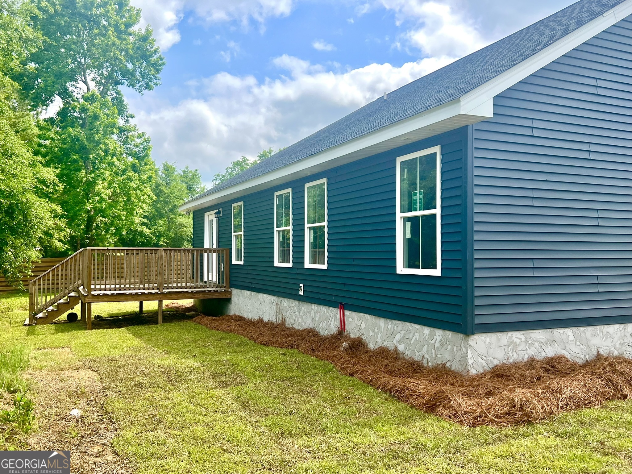 120 Caleb Circle Jesup, GA 31545 - Photo 22 of 22 a house view with a garden space