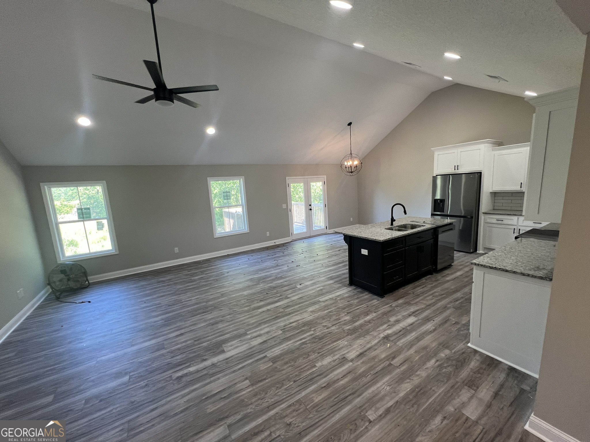 120 Caleb Circle Jesup, GA 31545 - Photo 8 of 22 a open kitchen with sink and cabinets