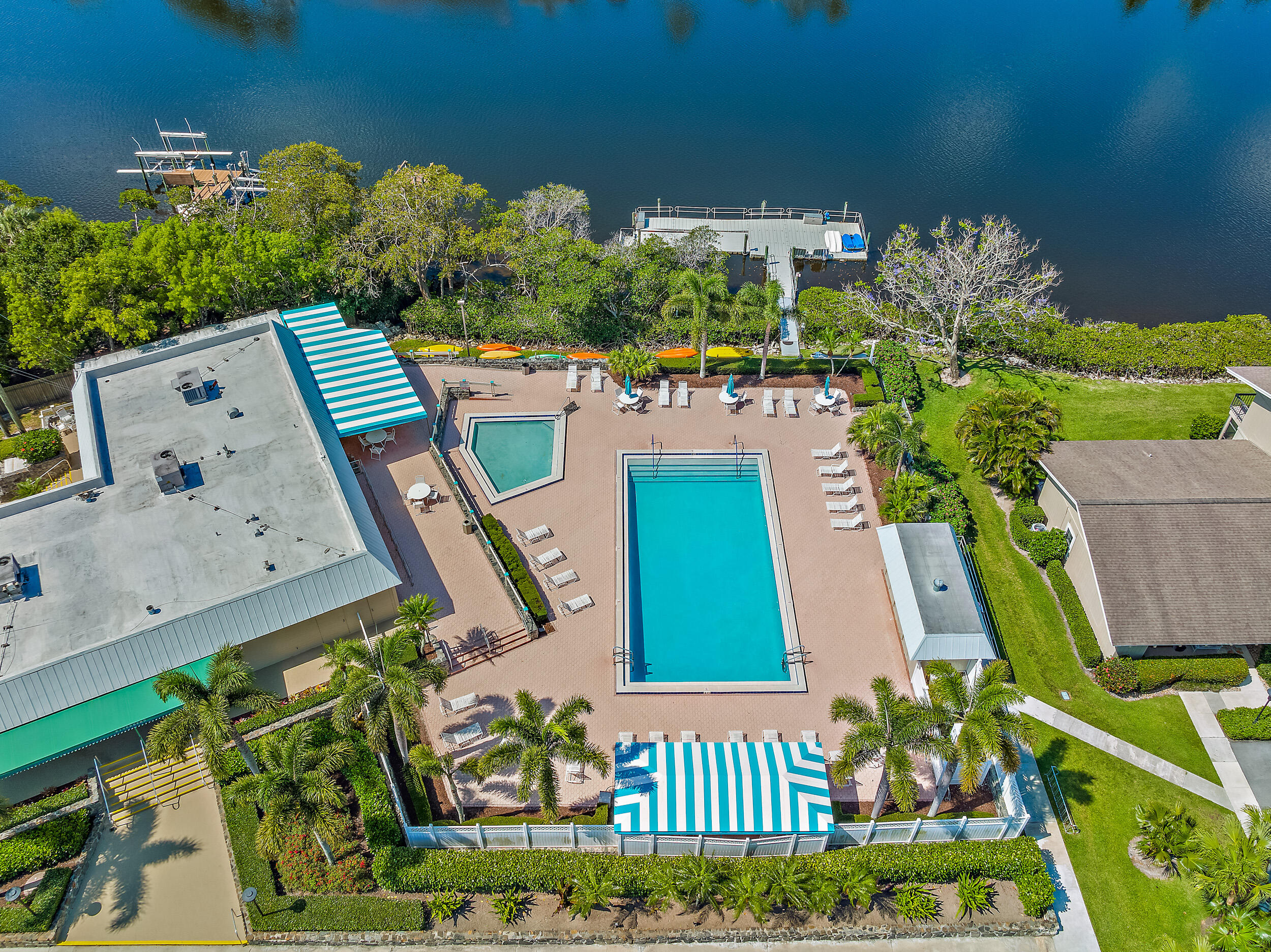 9170 Southeast Riverfront Terrace, Unit H Jupiter, FL 33469 - Photo 32 of 34 an aerial view of a house