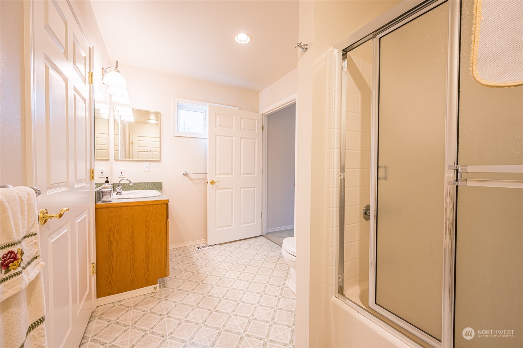 1545 Ripley Creek Road Quilcene, WA 98376 - Photo 17 of 23 a bathroom with a shower and a sink