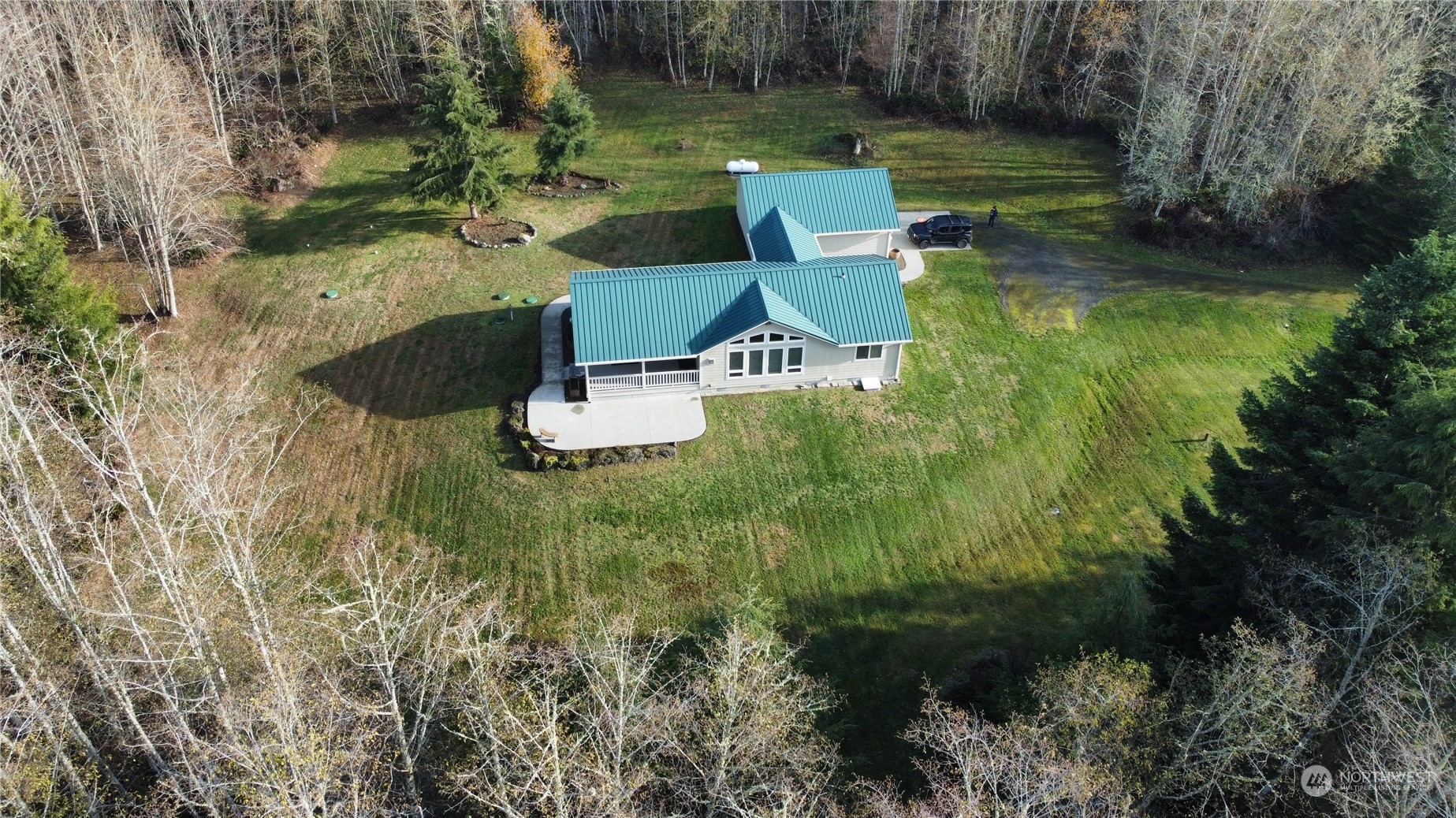 1545 Ripley Creek Road Quilcene, WA 98376 - Photo 2 of 23 a view of a house with a yard