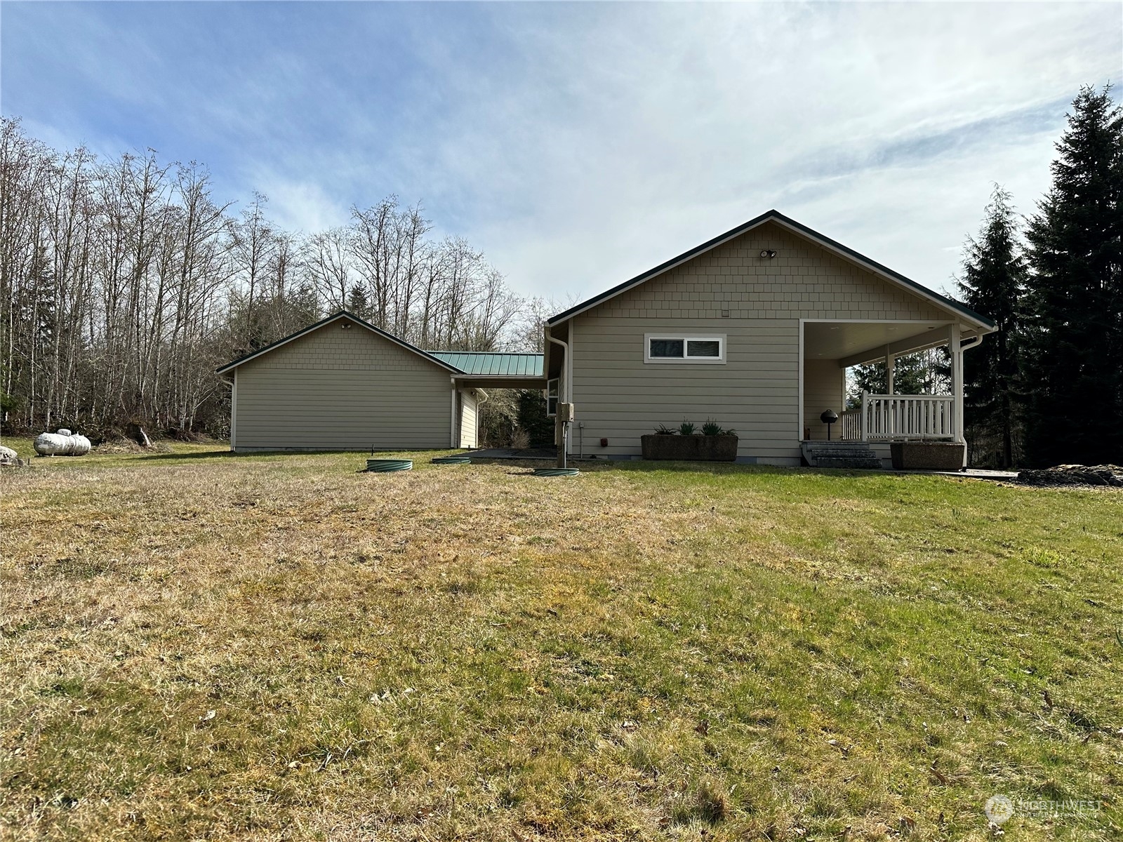 1545 Ripley Creek Road Quilcene, WA 98376 - Photo 7 of 23 a house with trees in the background