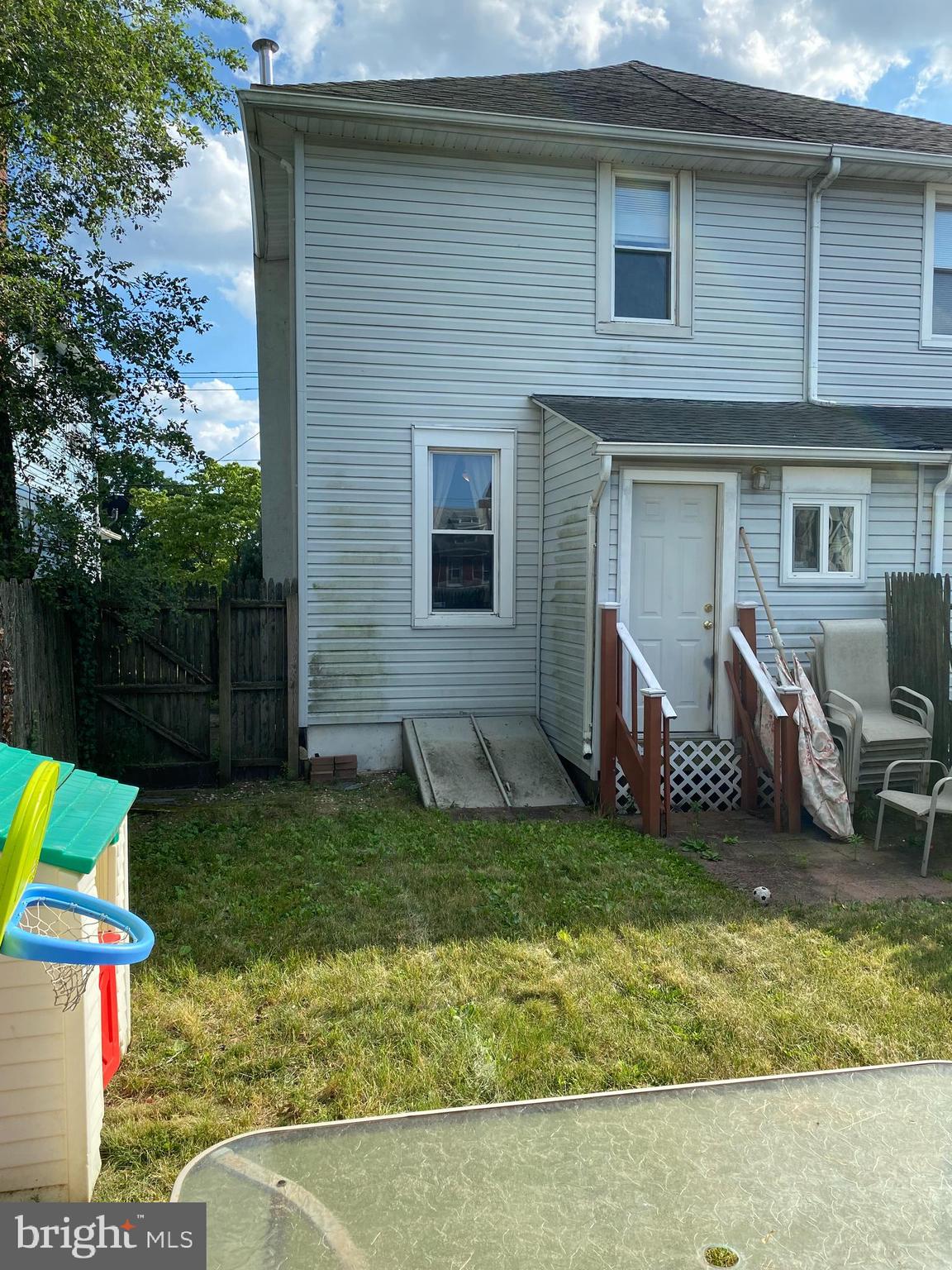 527 Bridgeboro Street Riverside, NJ 08075 - Photo 19 of 20 a view of a house with backyard tub and fire pit