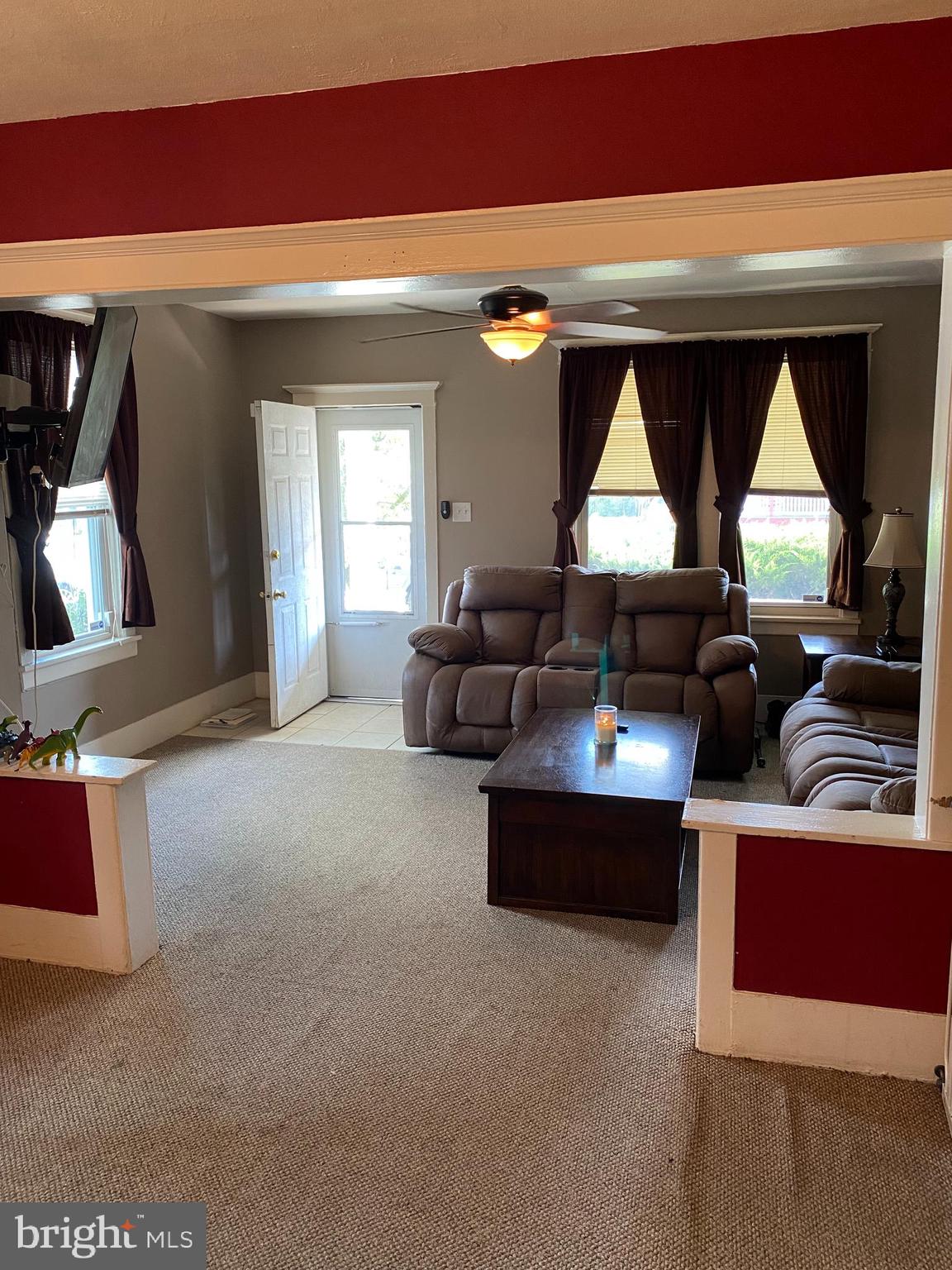 527 Bridgeboro Street Riverside, NJ 08075 - Photo 8 of 20 a living room with furniture and a large window