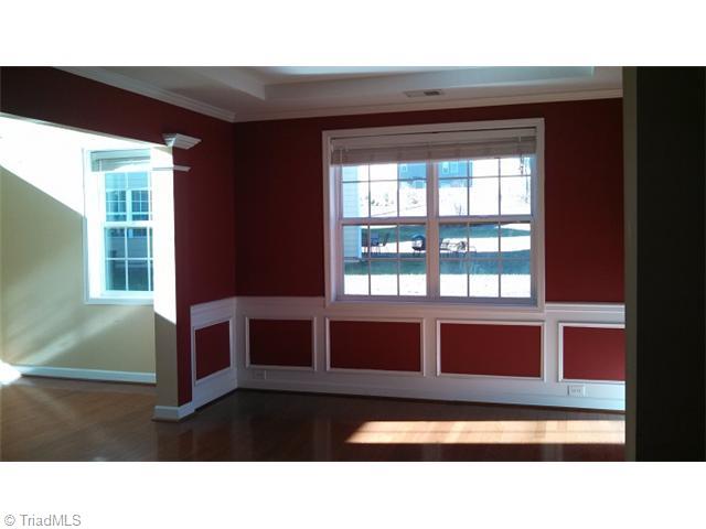 4637 River Valley Road High Point, NC 27265 - Photo 4 of 11 Dining Room. The dining room has custom moldings, trey ceilings and wood floors.