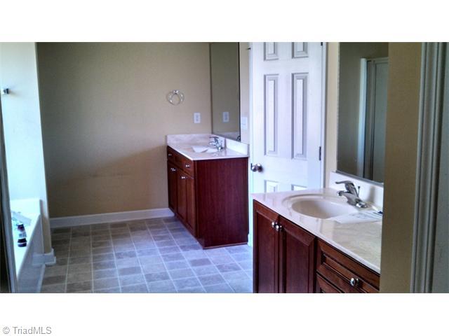 4637 River Valley Road High Point, NC 27265 - Photo 10 of 11 Master Bath/Spa. Master bath has double vanities, garden tub, walk in closet and separate shower.