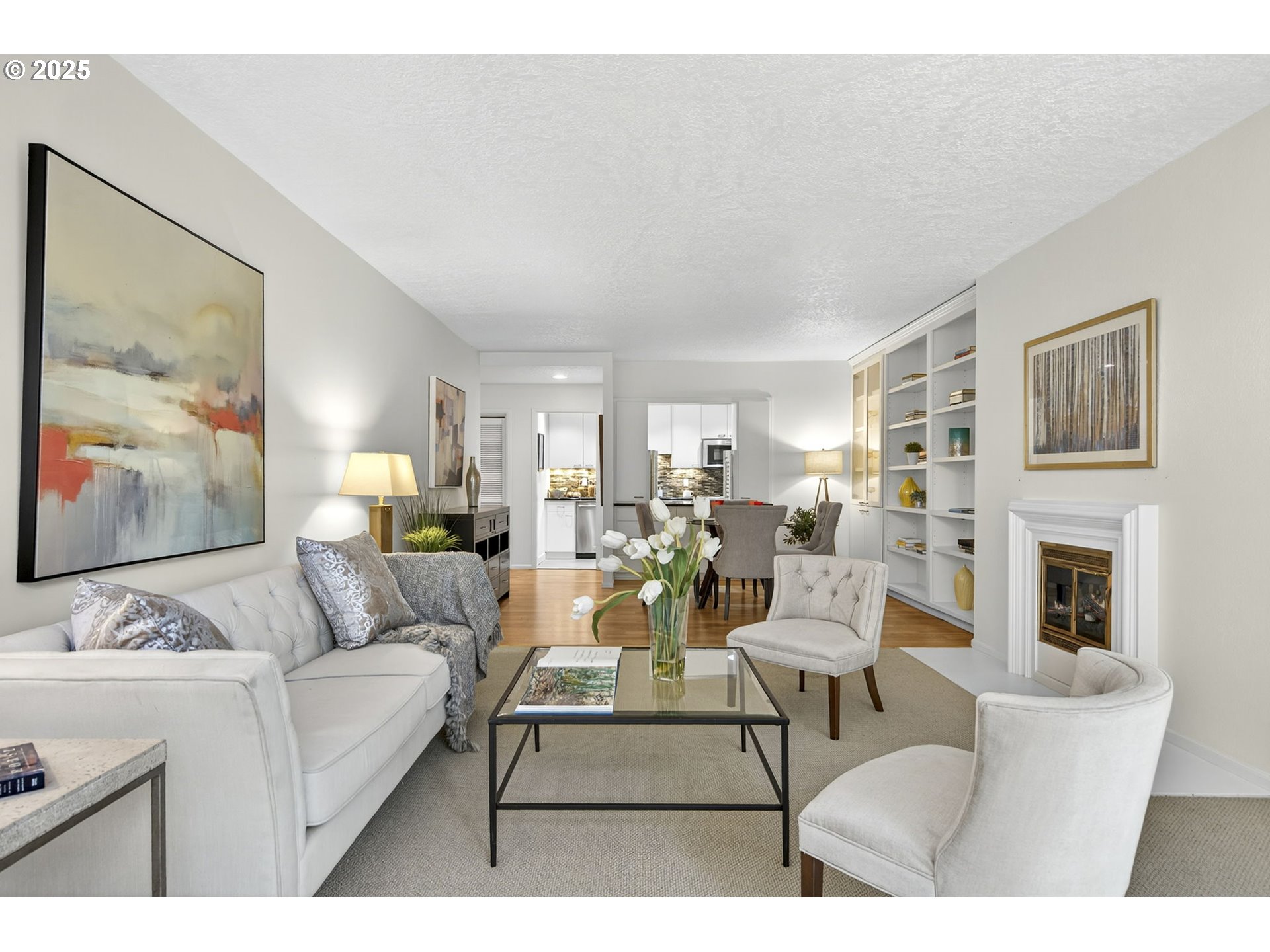 2309 Southwest 1st Avenue, Unit G41 Portland, OR 97201 - Photo 16 of 44 a living room with fireplace furniture and a flat screen tv