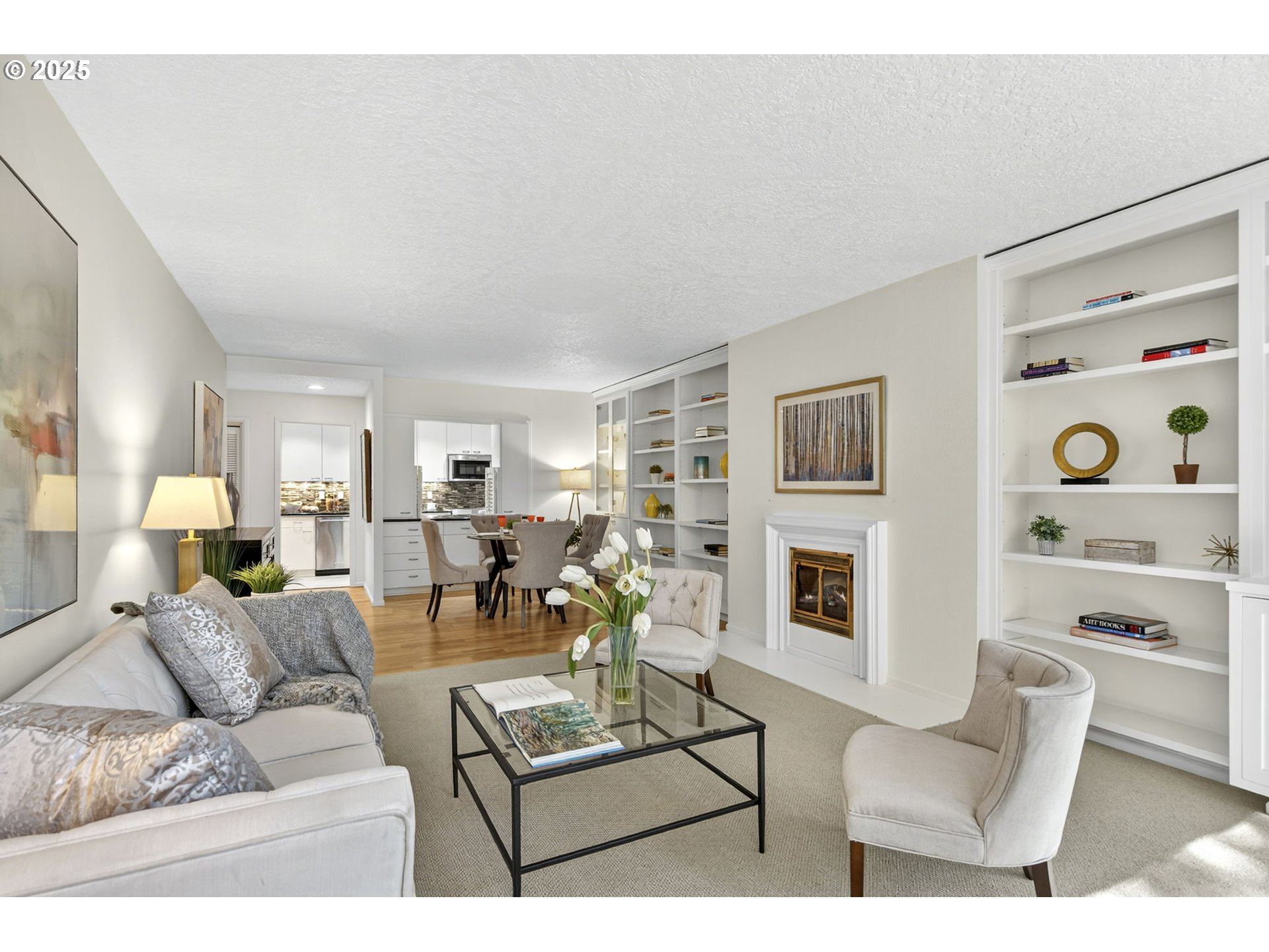 2309 Southwest 1st Avenue, Unit G41 Portland, OR 97201 - Photo 17 of 44 a living room with fireplace furniture and flat screen tv