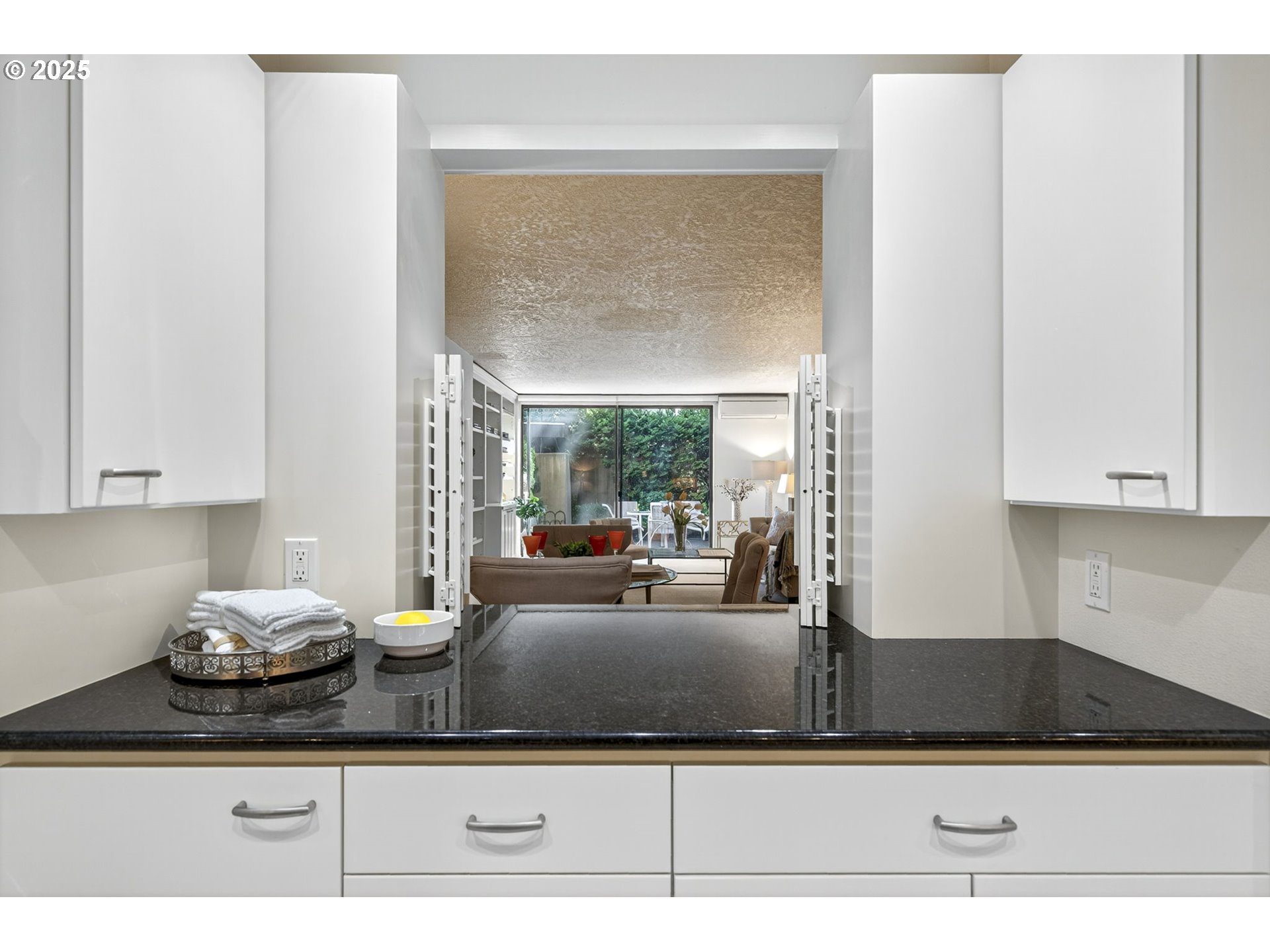 2309 Southwest 1st Avenue, Unit G41 Portland, OR 97201 - Photo 25 of 44 a kitchen with a sink and cabinets