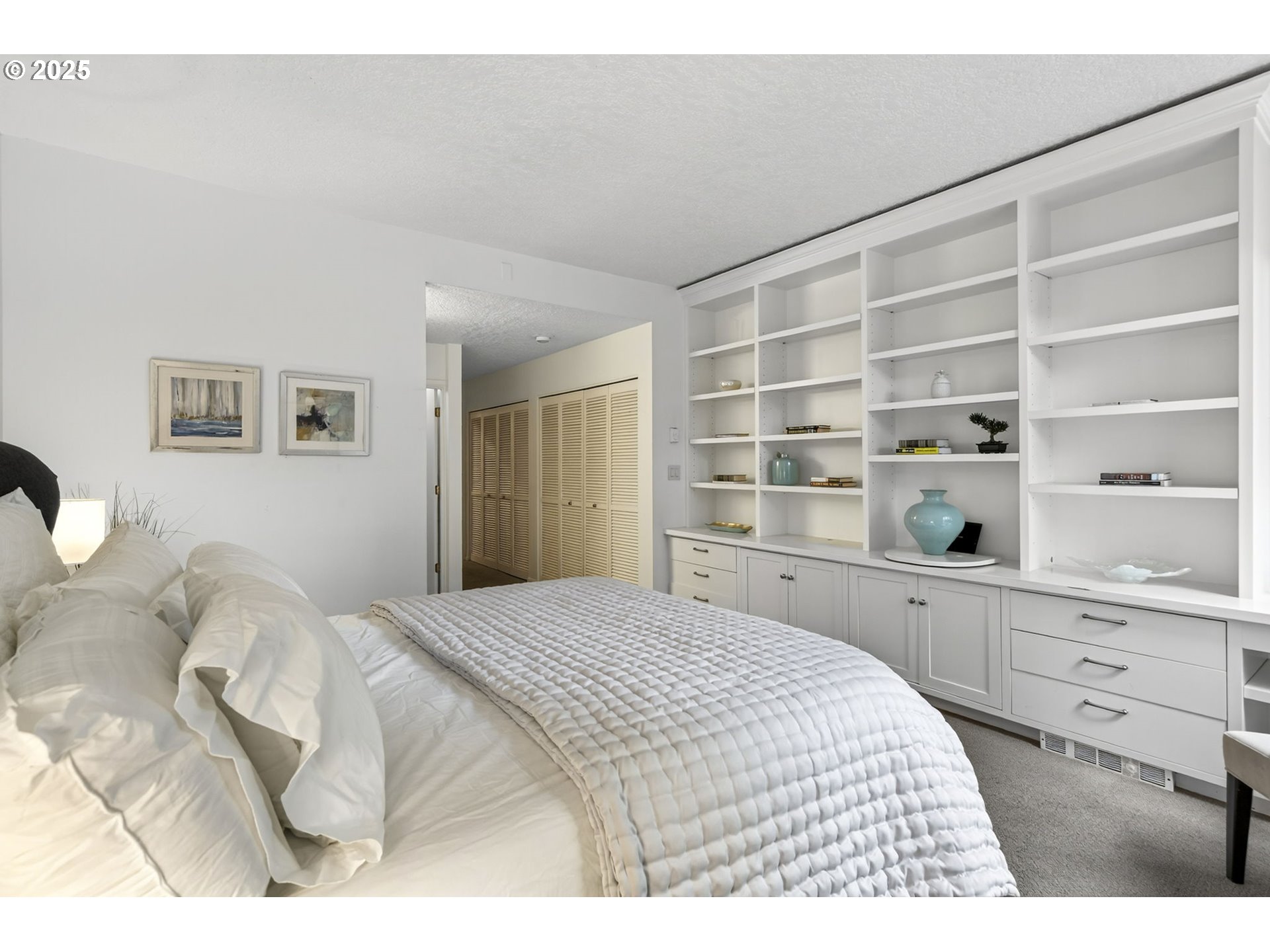 2309 Southwest 1st Avenue, Unit G41 Portland, OR 97201 - Photo 29 of 44 a bedroom with a bed and closet