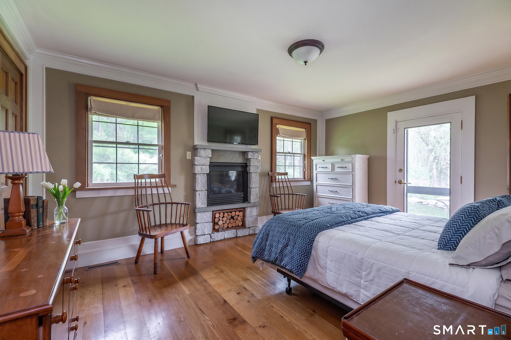 262 Kent Cornwall Road Kent, CT 06757 - Photo 12 of 17 a bedroom with a bed and wooden floor