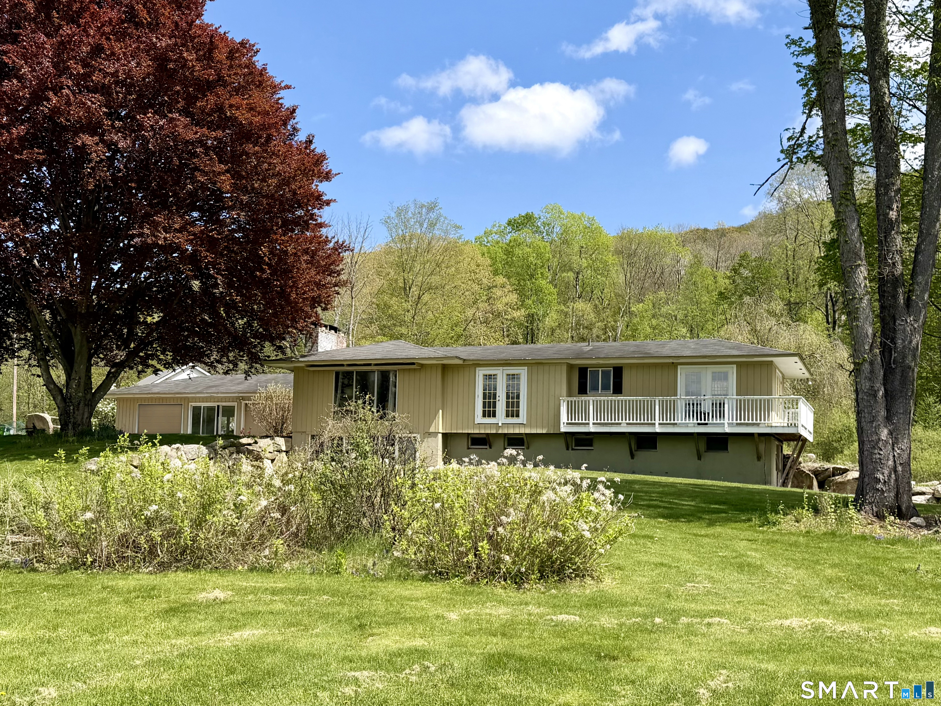 262 Kent Cornwall Road Kent, CT 06757 - Photo 15 of 17 a front view of a house with a yard