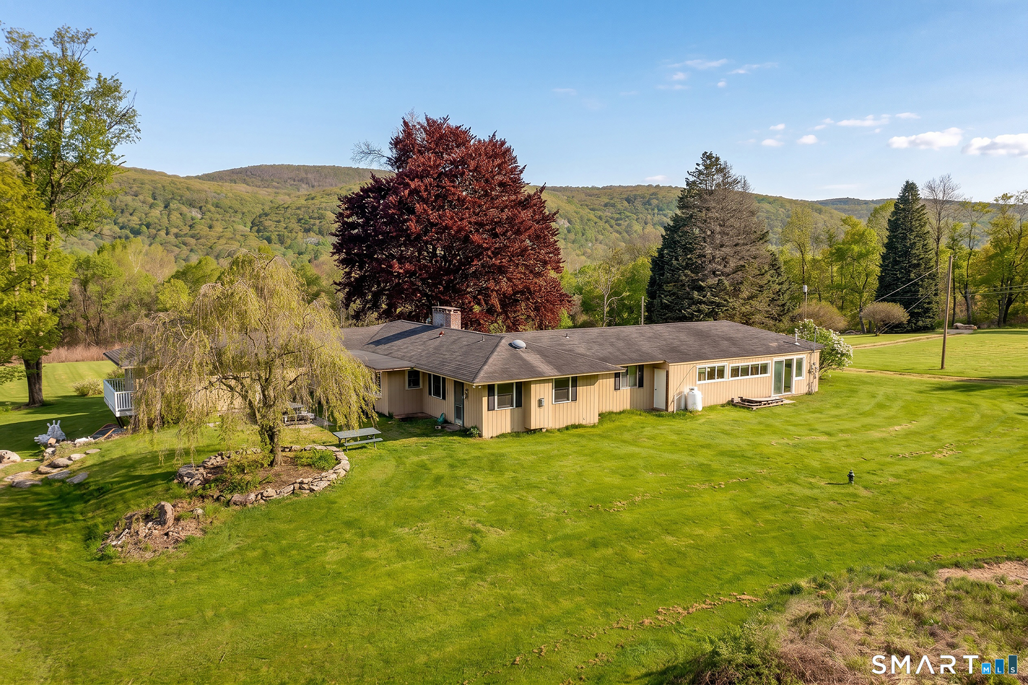 262 Kent Cornwall Road Kent, CT 06757 - Photo 4 of 17 a view of a house with a big yard