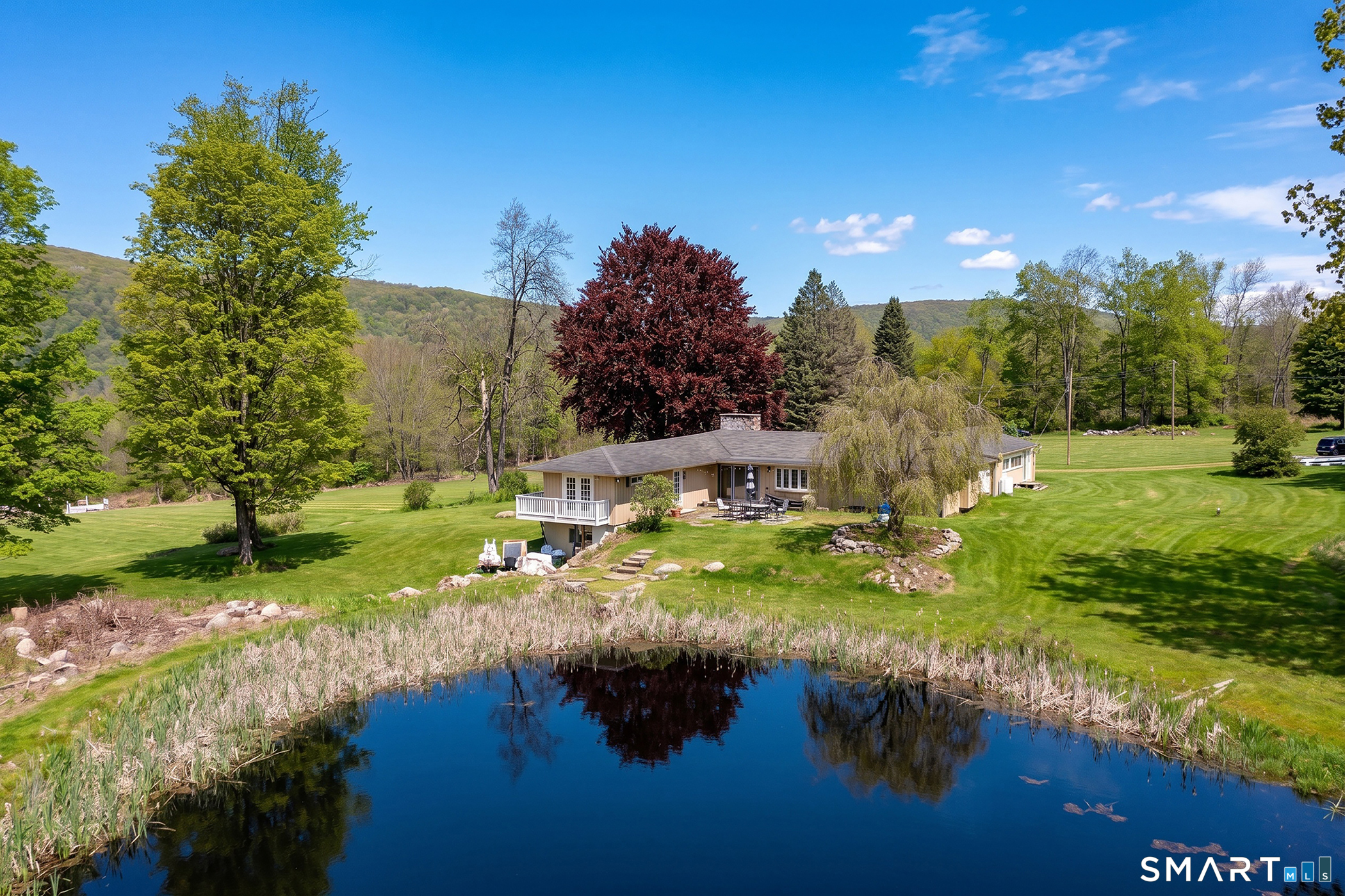 262 Kent Cornwall Road Kent, CT 06757 - Photo 7 of 17 a view of a lake with houses
