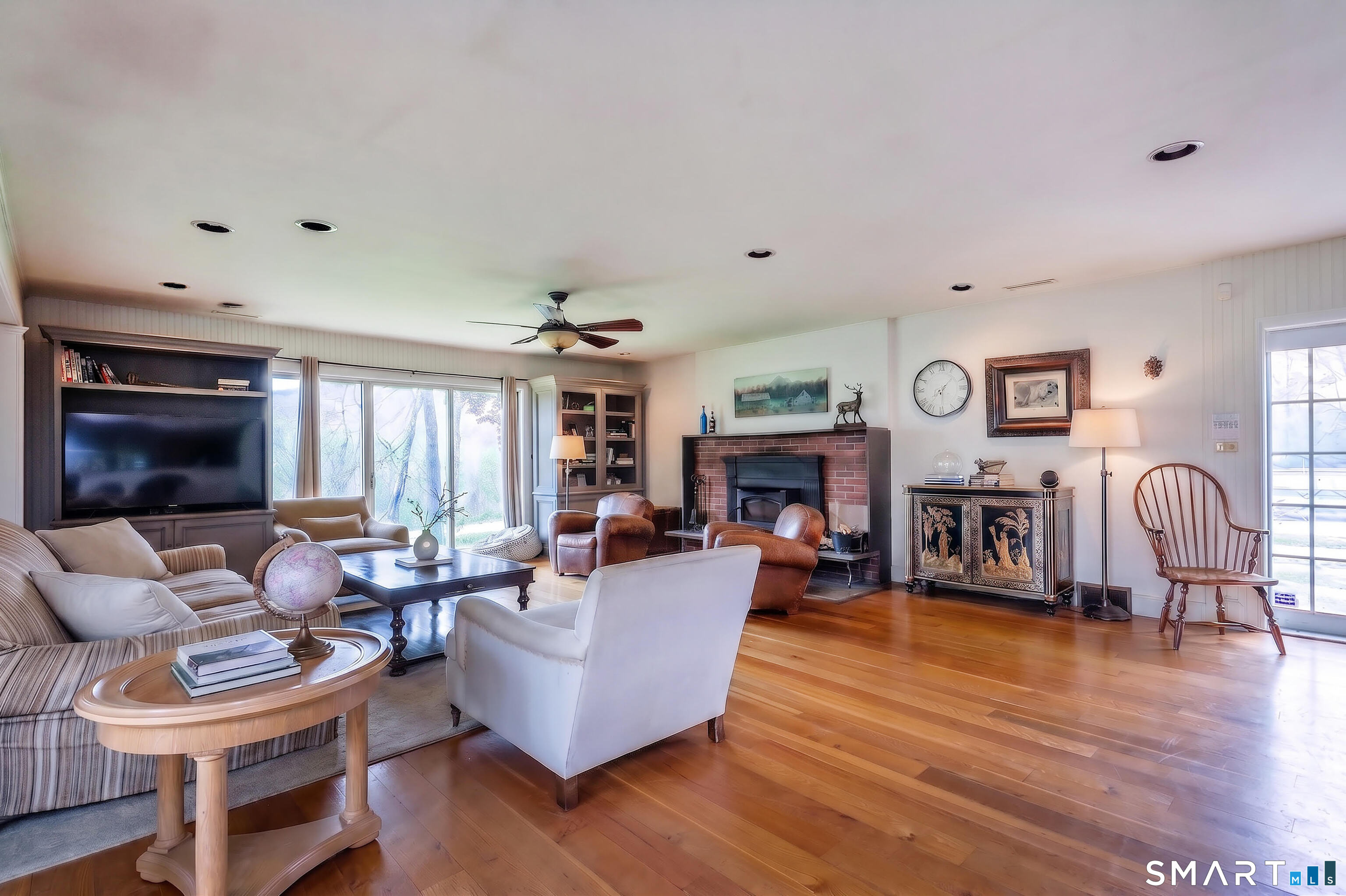 262 Kent Cornwall Road Kent, CT 06757 - Photo 8 of 17 a living room with fireplace furniture and a wooden floor