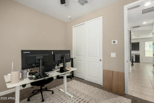 a living room with furniture and rug