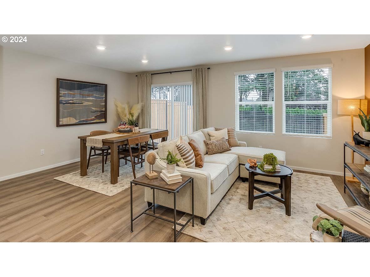 1463 Southeast Pheasant Avenue Gresham, OR 97080 - Photo 10 of 32 a living room with furniture and a large window