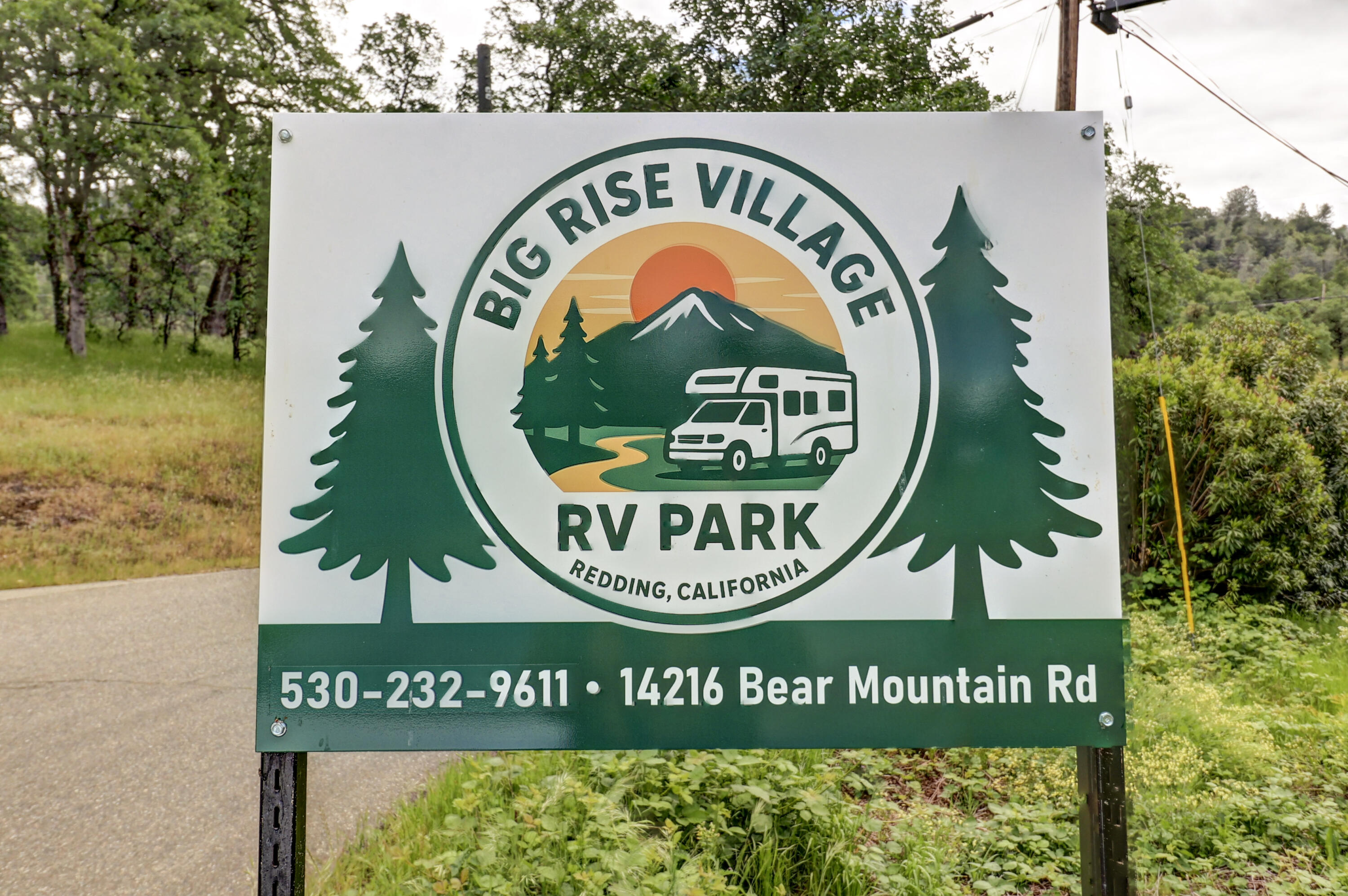 14216 Bear Mountain Road, Unit 48 Redding, CA 96003 - Photo 15 of 17 a sign that is on a bench in front of the road