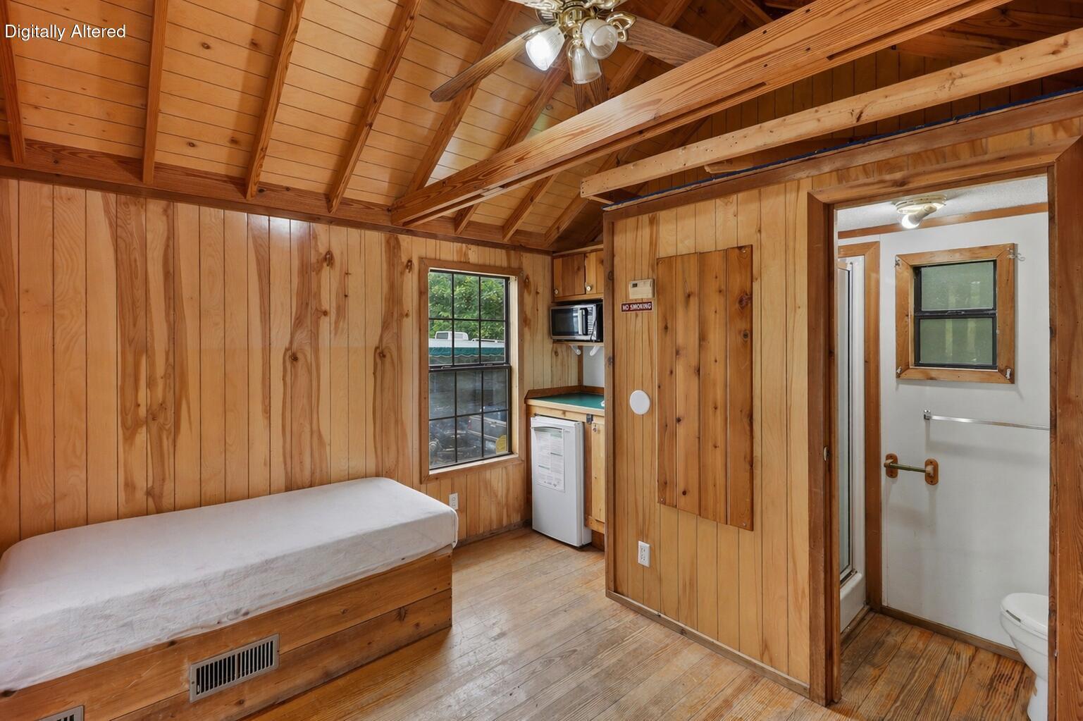 14216 Bear Mountain Road, Unit 48 Redding, CA 96003 - Photo 3 of 17 a room with a bed and a dresser