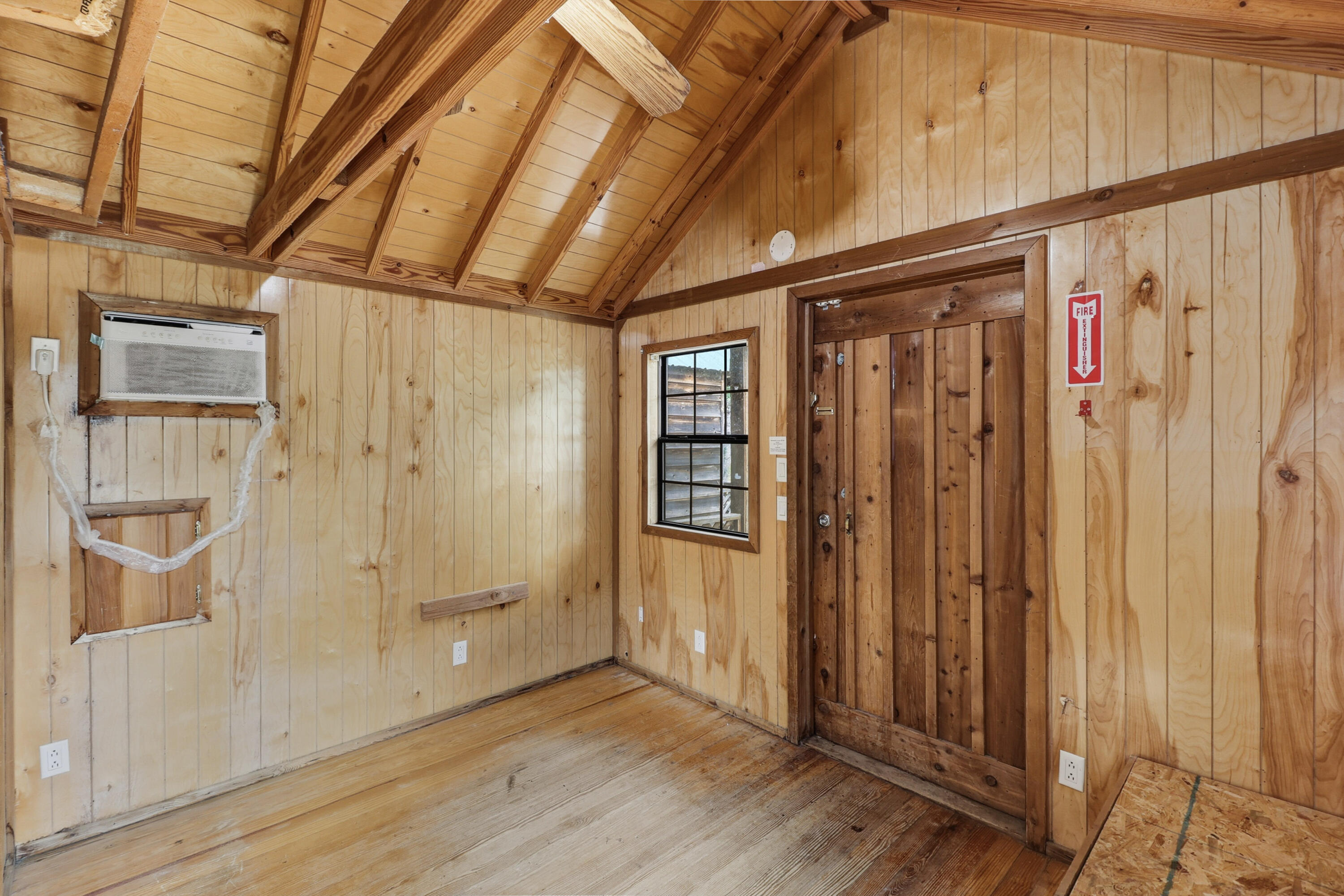 14216 Bear Mountain Road, Unit 48 Redding, CA 96003 - Photo 6 of 17 a view of an empty room with wooden floor