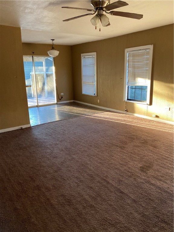Undisclosed Address Alice, TX 78332 - Photo 3 of 8 an empty room with windows and fan