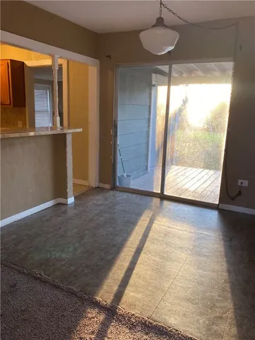 a view of an empty room and window