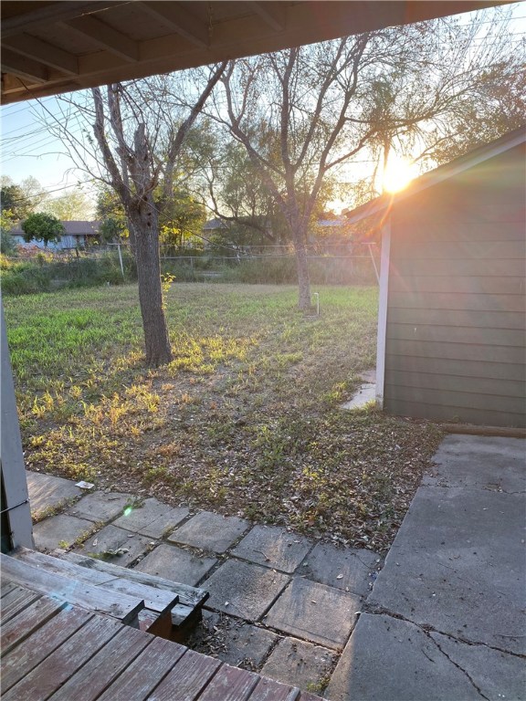 Undisclosed Address Alice, TX 78332 - Photo 8 of 8 a view of a yard with a tree