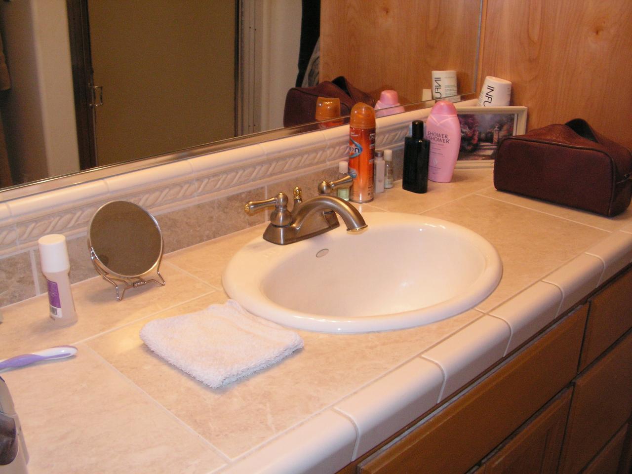 5757 Bell Road Redding, CA 96001 - Photo 16 of 16 a bathroom with a sink and mirror