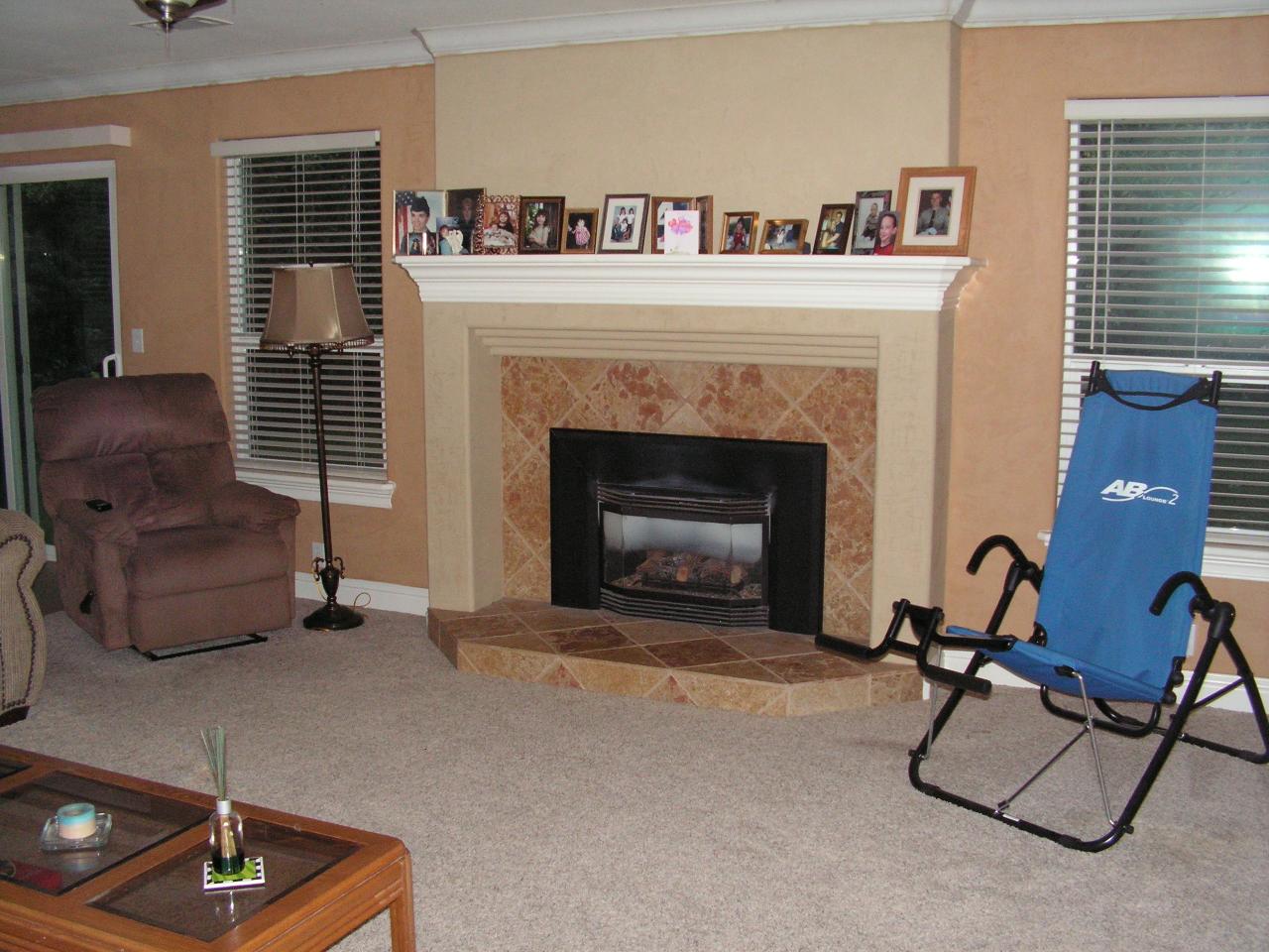 5757 Bell Road Redding, CA 96001 - Photo 4 of 16 a living room with furniture and a fireplace