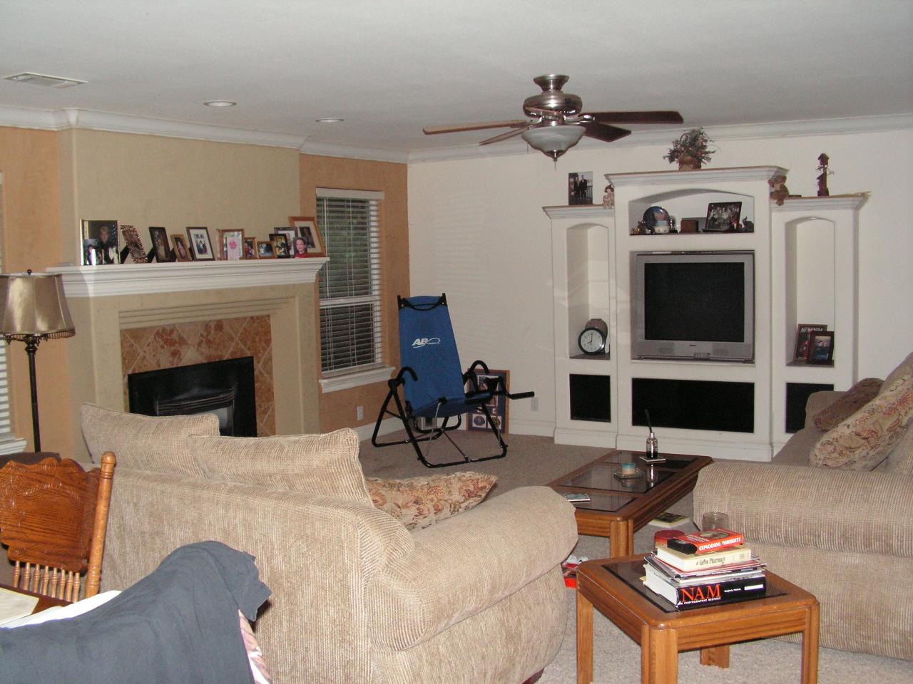 5757 Bell Road Redding, CA 96001 - Photo 6 of 16 a living room with furniture and a fireplace