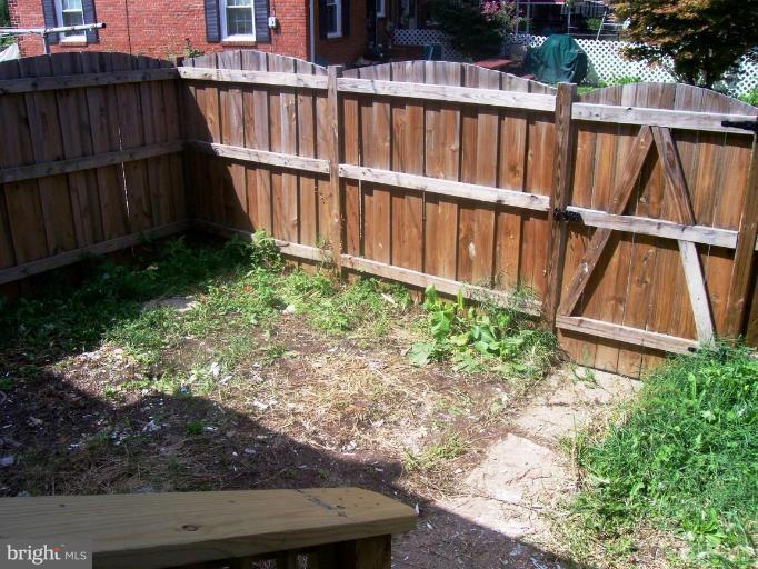 2462 Nevada Street Baltimore, MD 21230 - Photo 16 of 22 a view of entryway with wooden fence