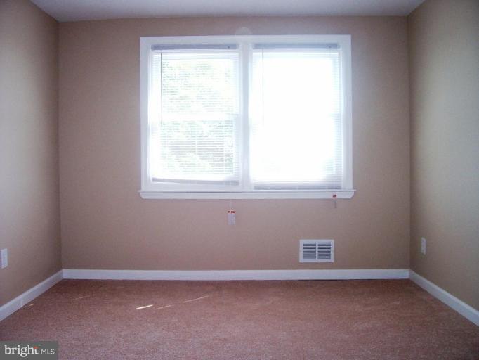 2462 Nevada Street Baltimore, MD 21230 - Photo 9 of 22 an empty room with a window