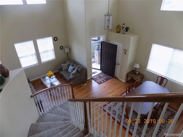 a view of a balcony with furniture