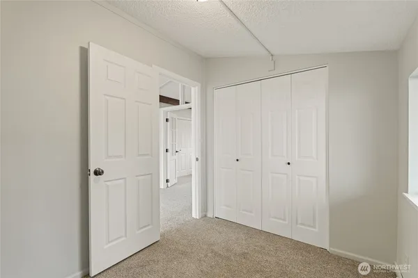 a view of entryway with stairs and wooden floor
