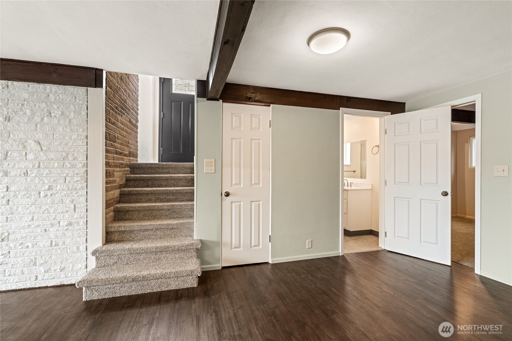 314 West 3rd Street Omak, WA 98841 - Photo 16 of 28 a view of entryway with stairs and wooden floor