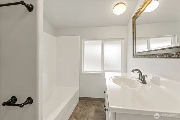 a view of livingroom with furniture wooden floor and window