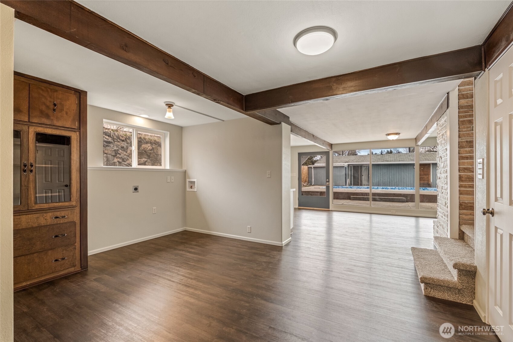 314 West 3rd Street Omak, WA 98841 - Photo 19 of 28 a view of livingroom with furniture wooden floor and window