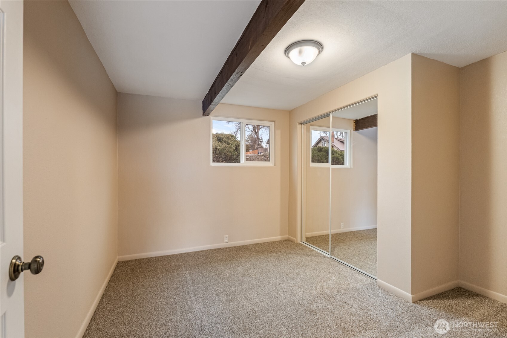 314 West 3rd Street Omak, WA 98841 - Photo 23 of 28 an empty room with windows
