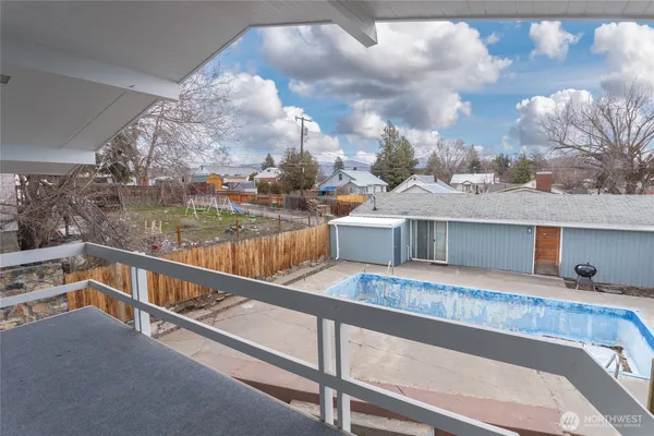 a bedroom with bed and tv