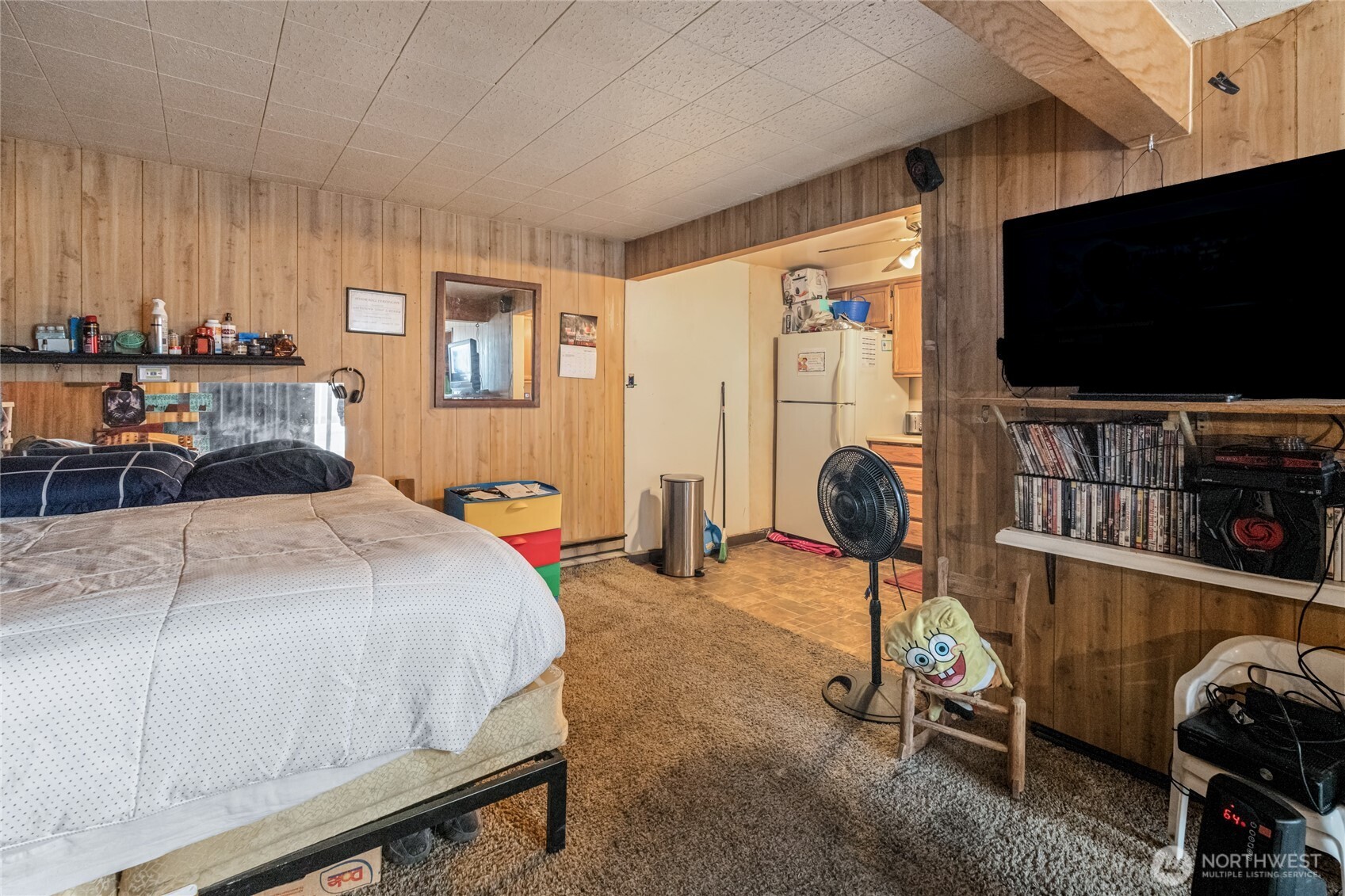 314 West 3rd Street Omak, WA 98841 - Photo 26 of 28 a bedroom with bed and tv