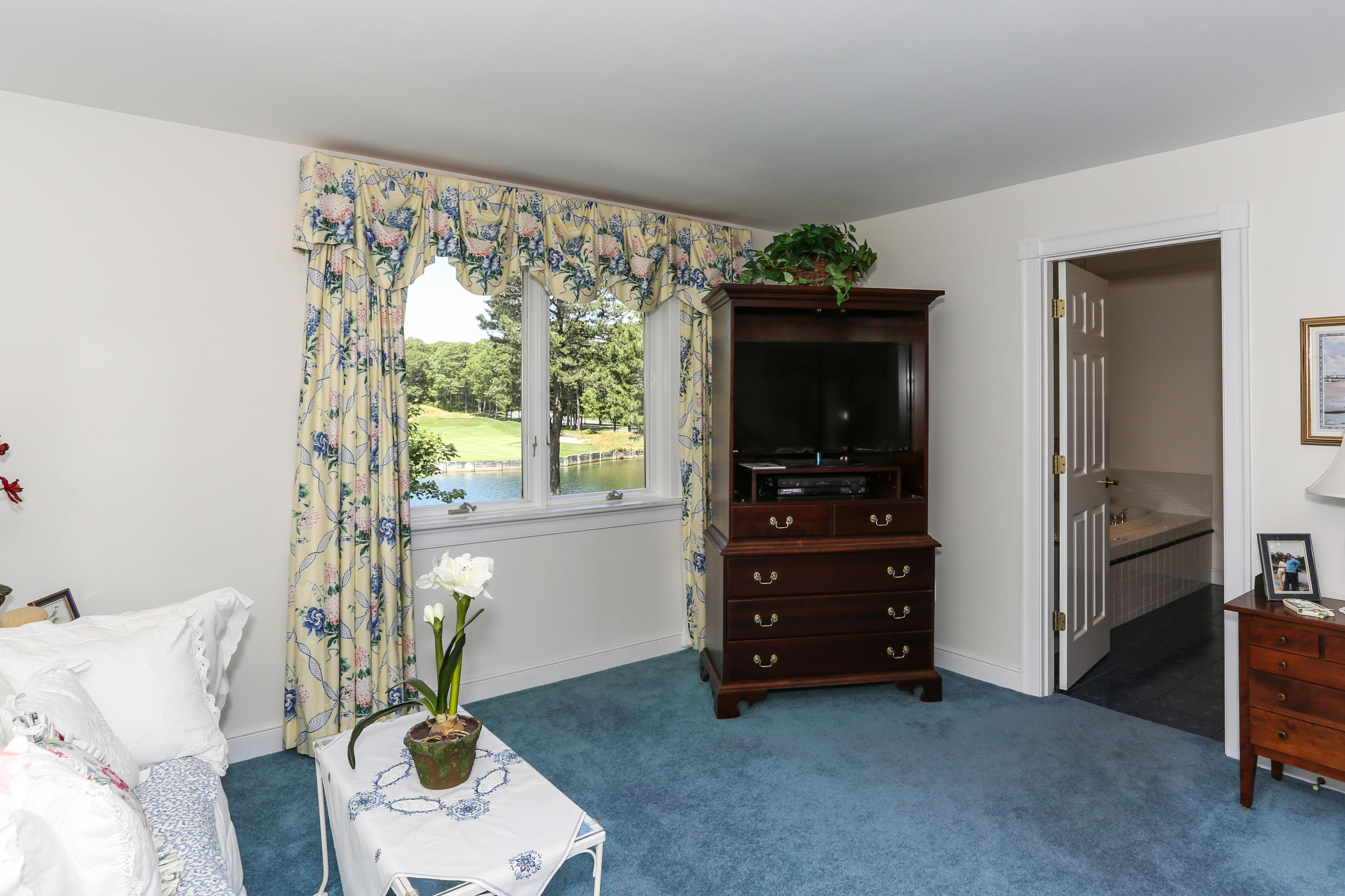 6 Reflection Drive Sandwich, MA 02563 - Photo 20 of 23 a living room with furniture and a window