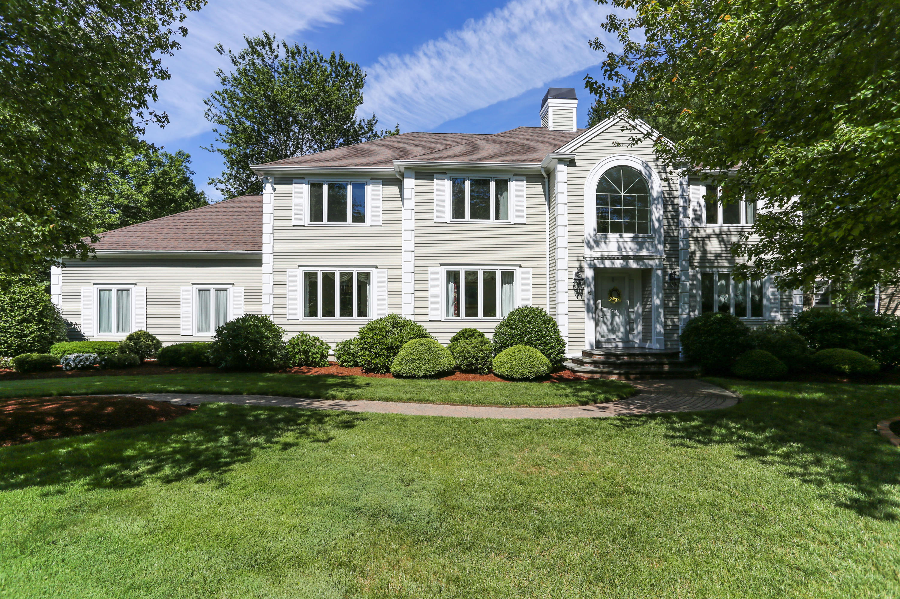 6 Reflection Drive Sandwich, MA 02563 - Photo 2 of 23 a front view of a house with a yard