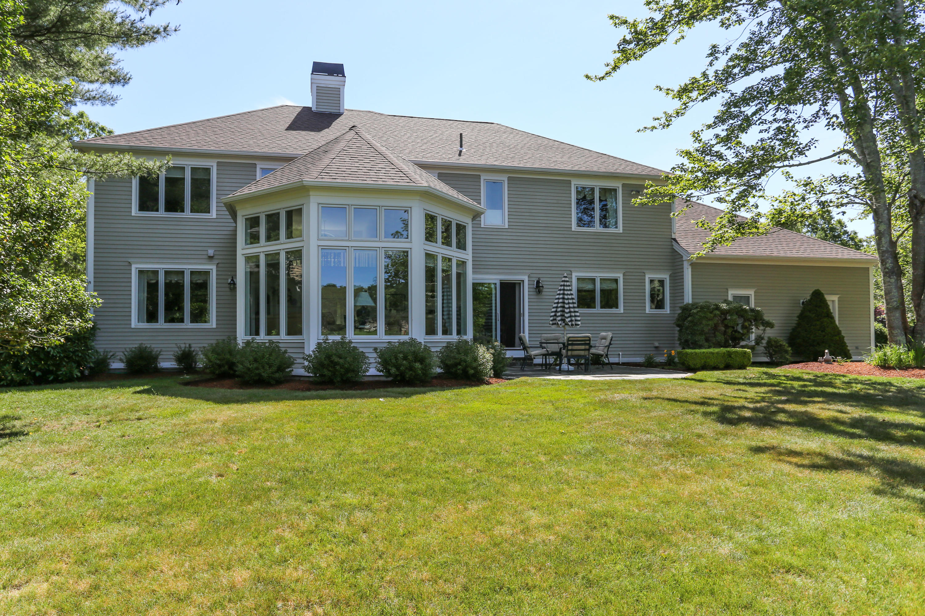 6 Reflection Drive Sandwich, MA 02563 - Photo 23 of 23 a front view of a house with a garden