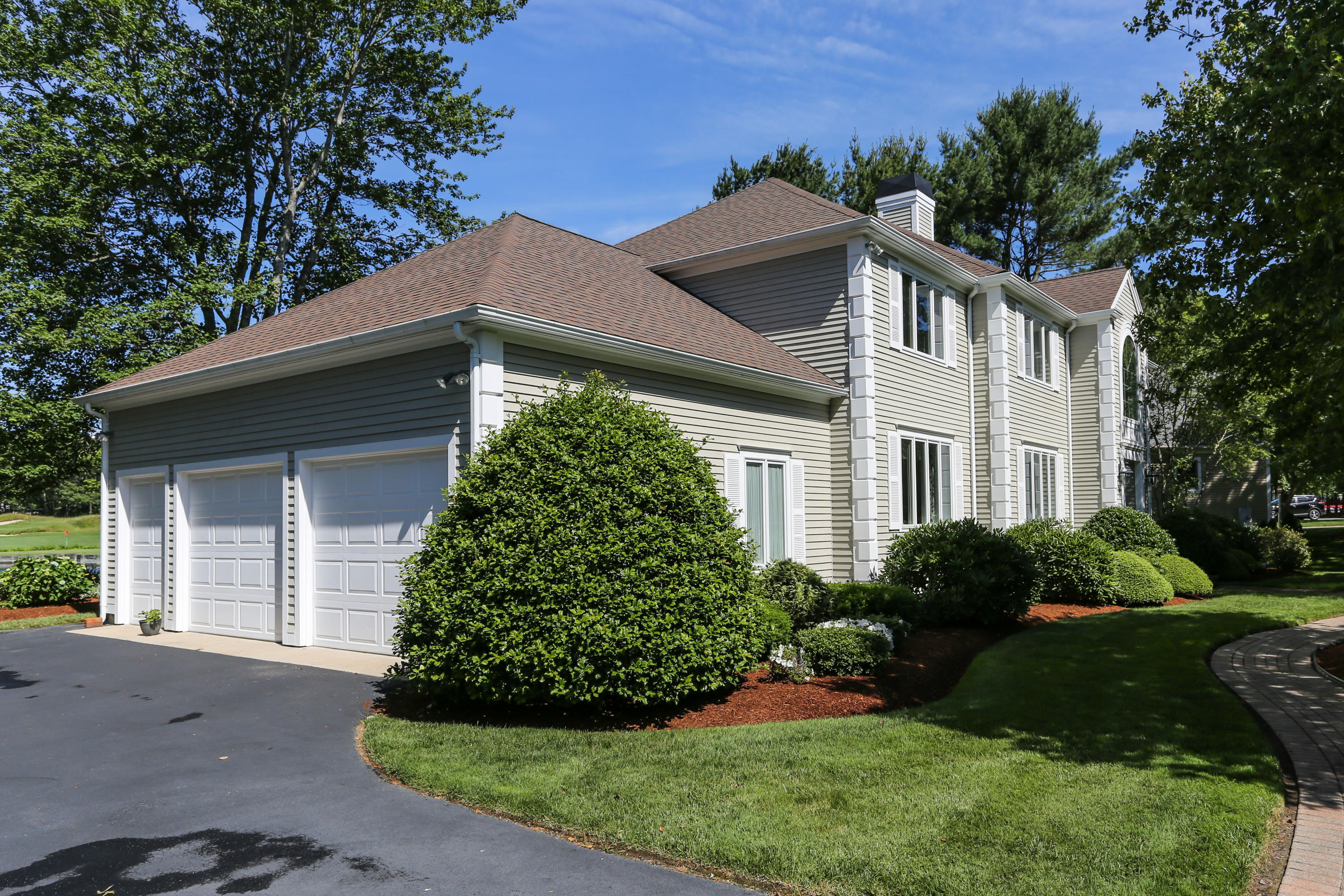 6 Reflection Drive Sandwich, MA 02563 - Photo 3 of 23 a front view of a house with a garden