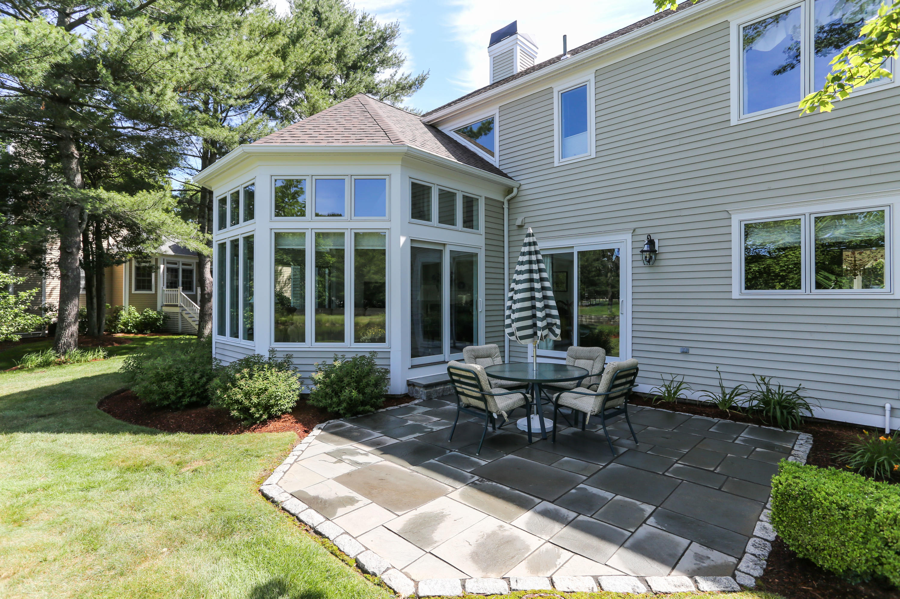 6 Reflection Drive Sandwich, MA 02563 - Photo 4 of 23 a view of a house with sitting area and garden