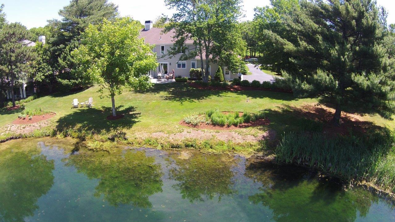6 Reflection Drive Sandwich, MA 02563 - Photo 6 of 23 a view of back yard of the house