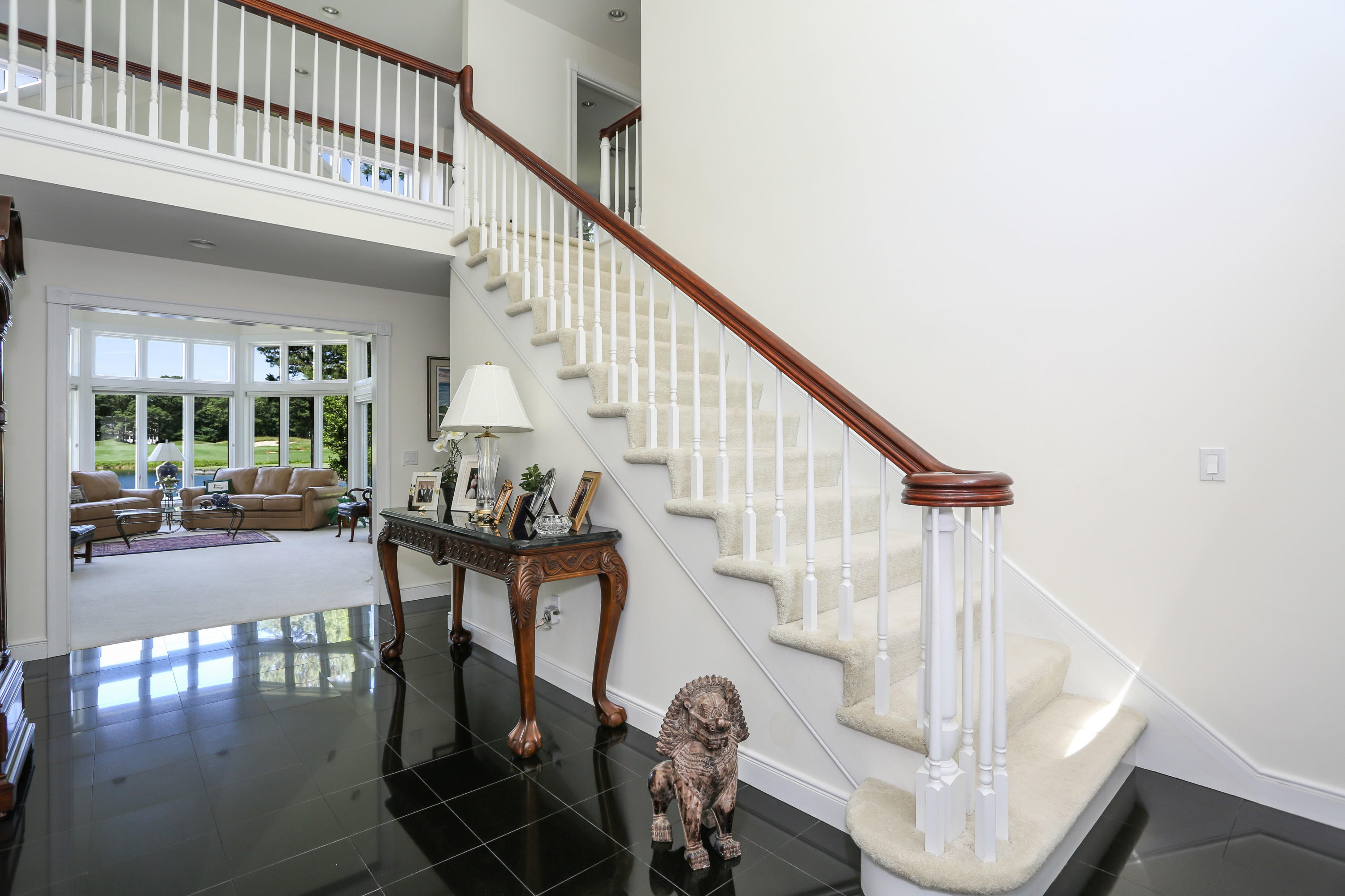 6 Reflection Drive Sandwich, MA 02563 - Photo 8 of 23 a view of entryway and hall with wooden floor