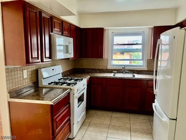 a view of bathroom and shower