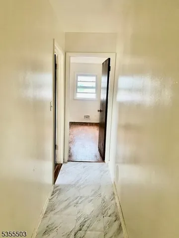 a kitchen with a stove and a cabinet